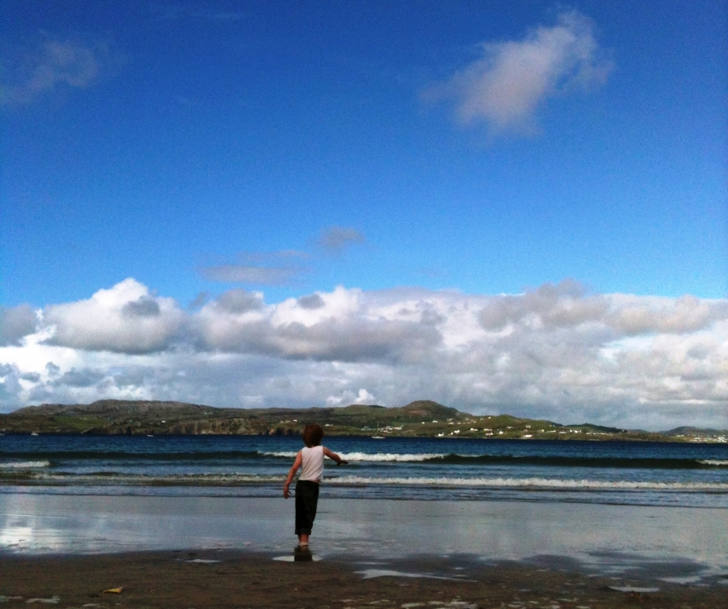 Stone skimming at Marble Hill beach.