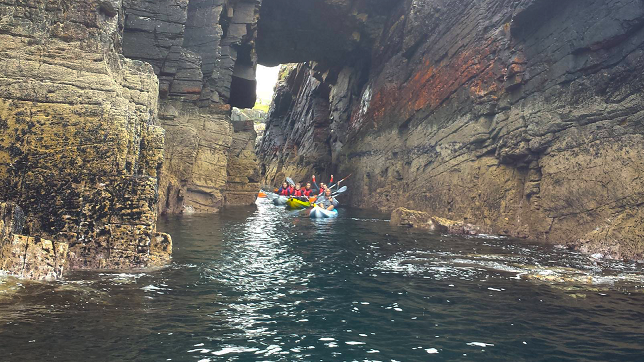 A group of people enjoying a kayaking trip with Jaws Watersport in County Donegal, Ireland.